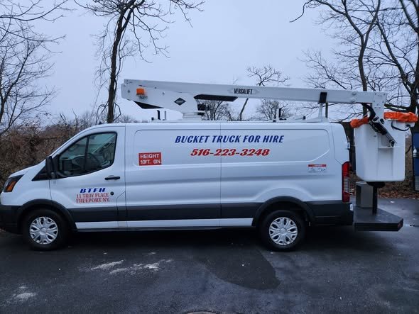 Side view of our white Ford Transit bucket van lettered Bucket Truck for Hire, 516-223-3248