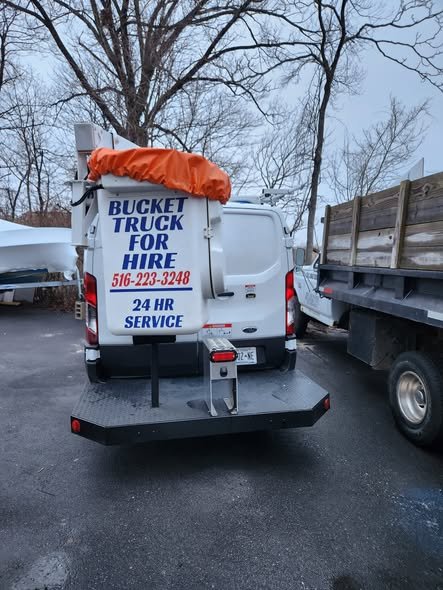Rear of our Transit bucket van lettered Bucket Truck for Hire, 516-223-3248, 24 hour service